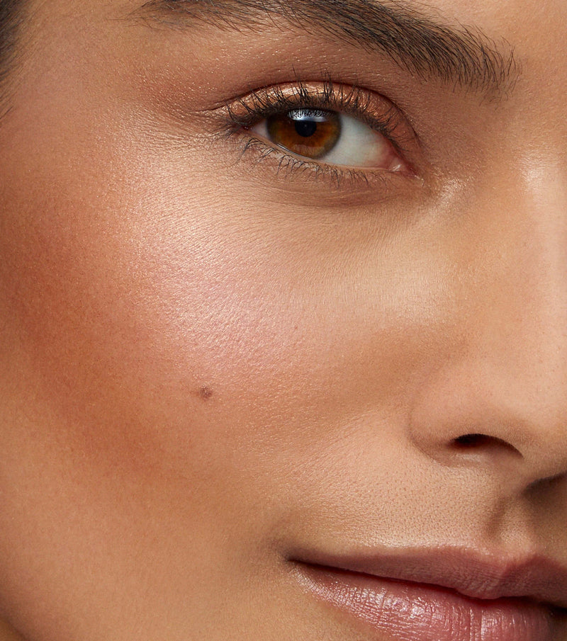 Super Loaded Tinted Highlight Peau de Soleil - Warm bronze gold 810102030320