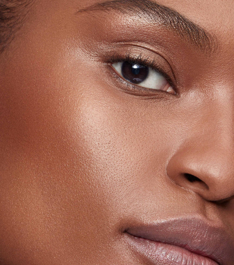 Super Loaded Tinted Highlight Peau de Soleil - Warm bronze gold 810102030320